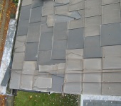 Cracked and damaged tiles requiring replacement by P & AS Hayselden Roofing Barnsley